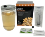 Midwest Premium XL Liquid Culture Kit with a 28-ounce jar, syringe, needle, and accessories for mushroom cultivation and spore germination.